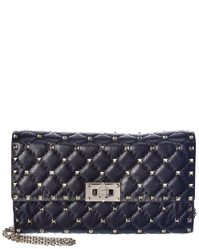 Handle bags with expandable sides for flexibility -Valentino Rockstud Spike Leather Crossbody