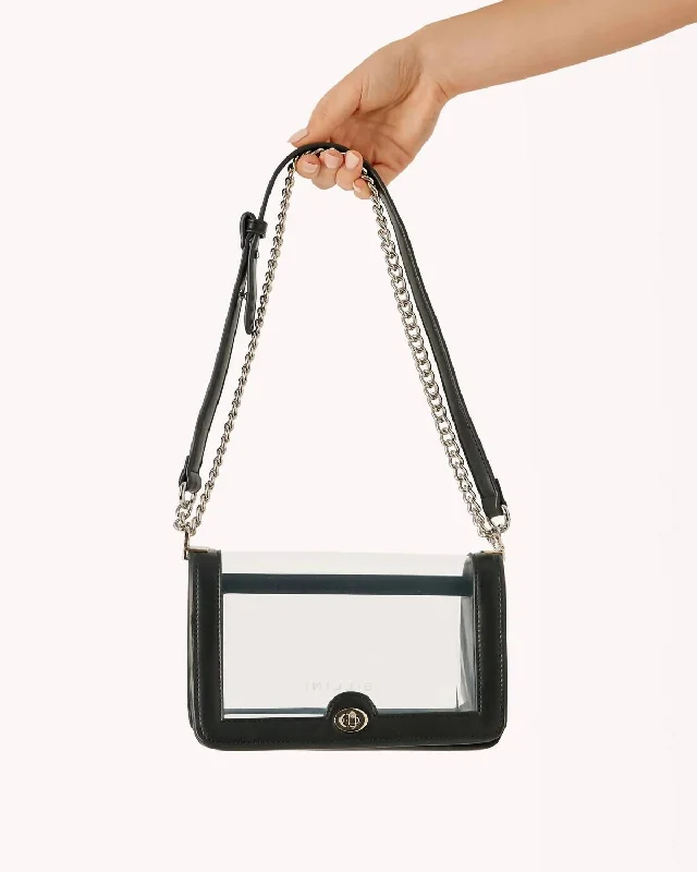 Handle bags with playful pom-poms for charm -Cara Clear Crossbody Bag In Black