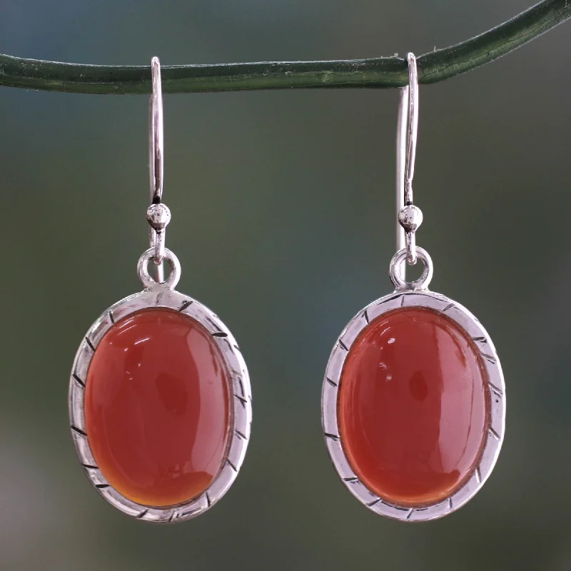 Hoop earrings with a matte black finish for a sleek, edgy vibe-Captivating Sunset Carnelian & Silver Dangle Earrings