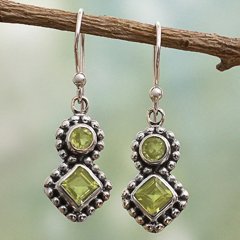 Hoop earrings with multi-tone finishes for a colorful and layered effect-Twin Aura Peridot & Silver Dangle Earrings